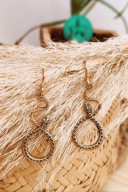 BOUCLES D OREILLES DOREES SEPRENT